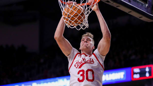 Dec 14, 2022; Cincinnati, Ohio, USA; Cincinnati Bearcats forward Viktor Lakhin (30) dunks on the Miami Redhawks in the first half at Fifth Third Arena. Mandatory Credit: Katie Stratman-USA TODAY Sports